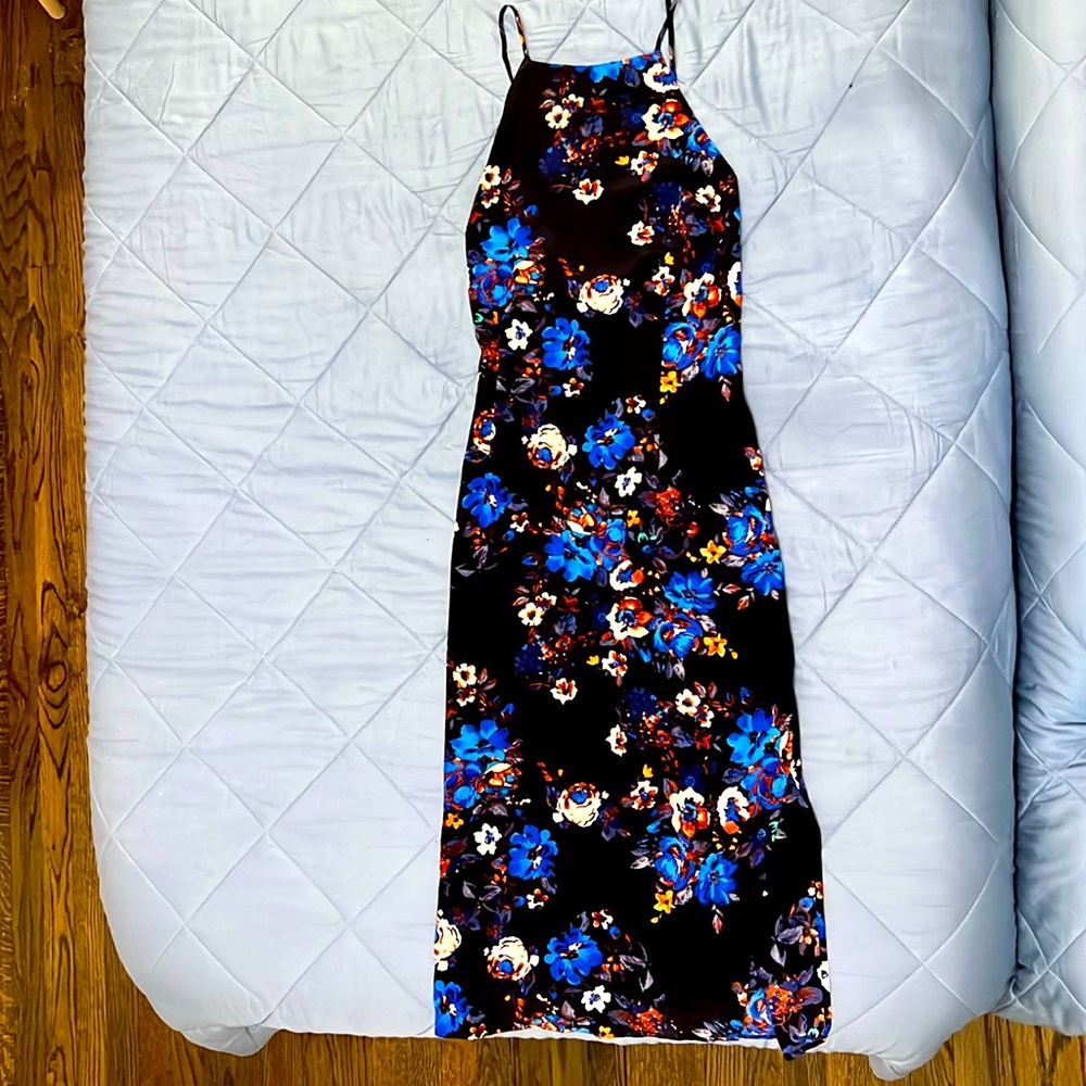 This is a Yumi Kim strappy cocktail dress. It’s perfect for a night out!